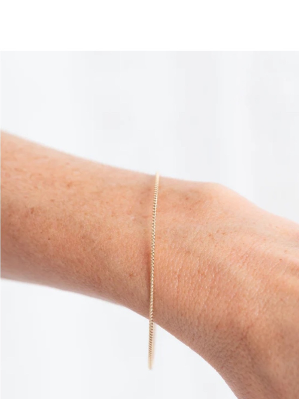 Genuine Yearly Co Thin Twist Bangle - Picture 5 of 7